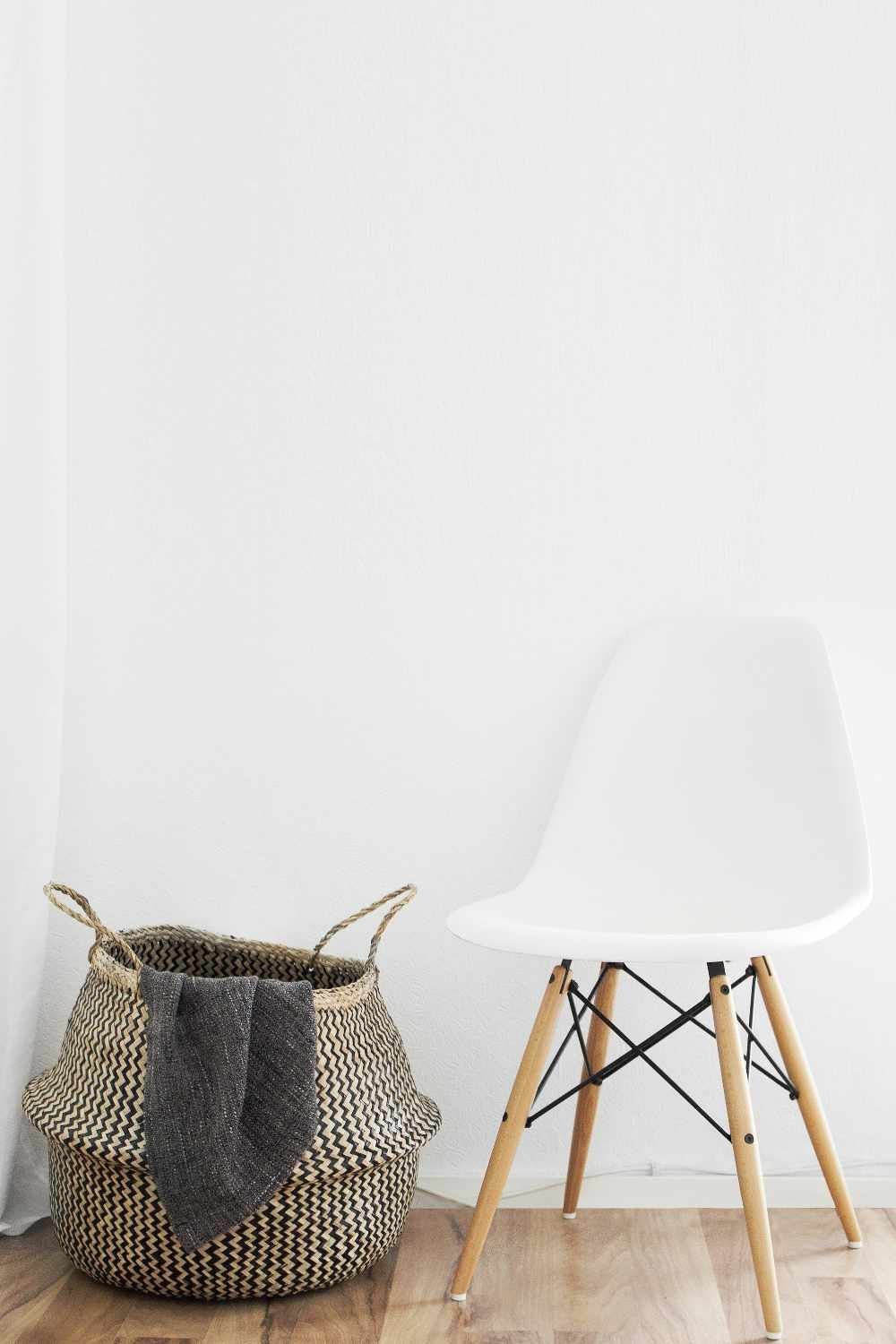 image of basket and small white chair by Sarah Dorweiler